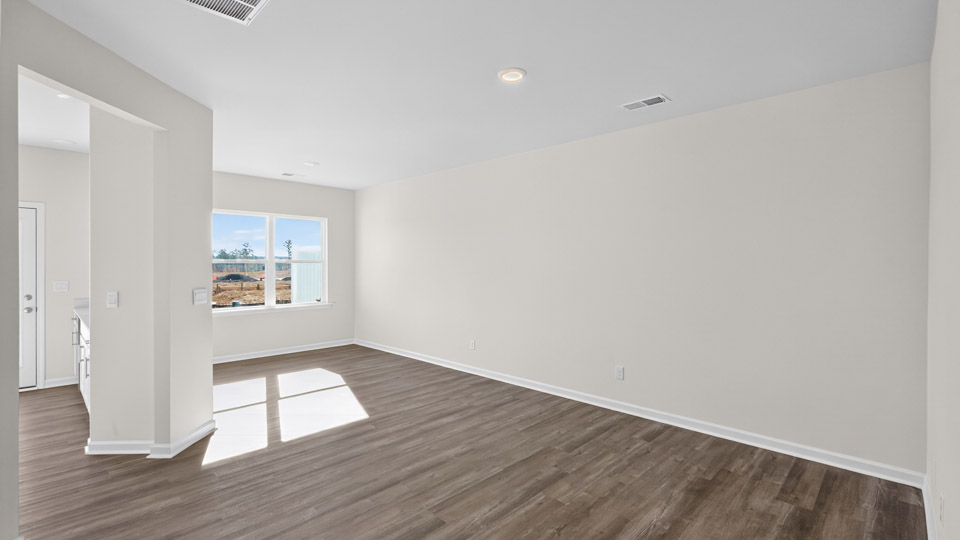 living room with revwood flooring
