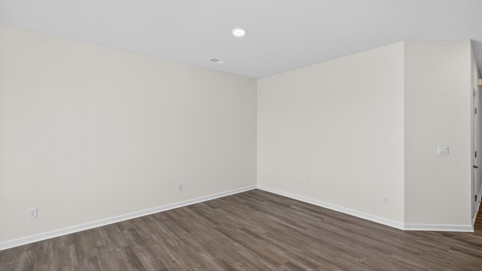 living room with revwood flooring