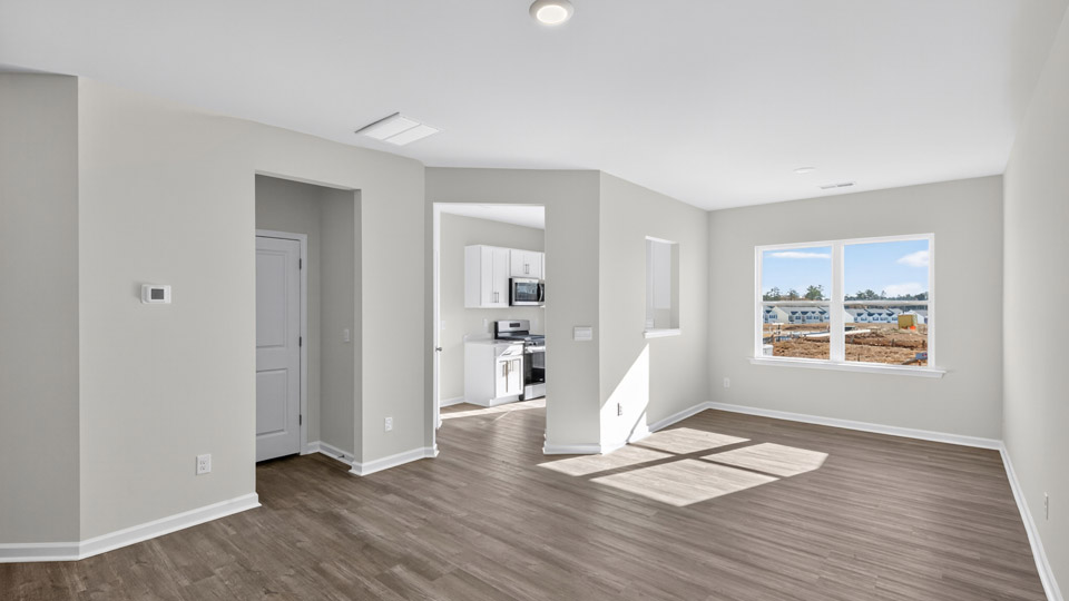 living room with revwood flooring
