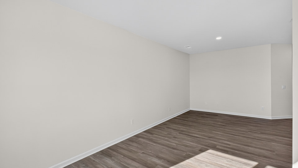 living room with revwood flooring