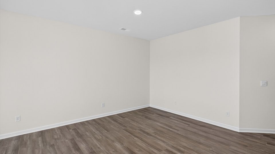 living room with revwood flooring