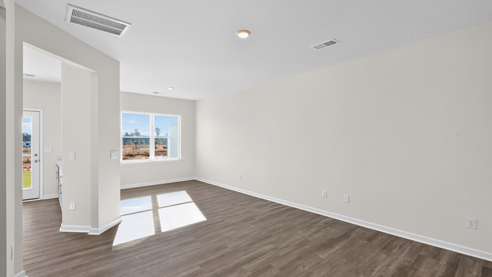 living room with revwood flooring
