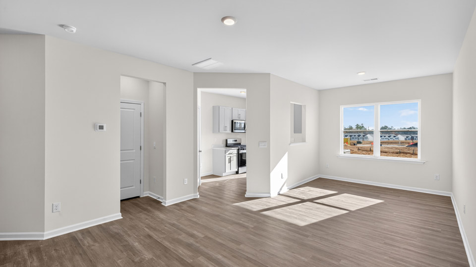 living room with revwood flooring