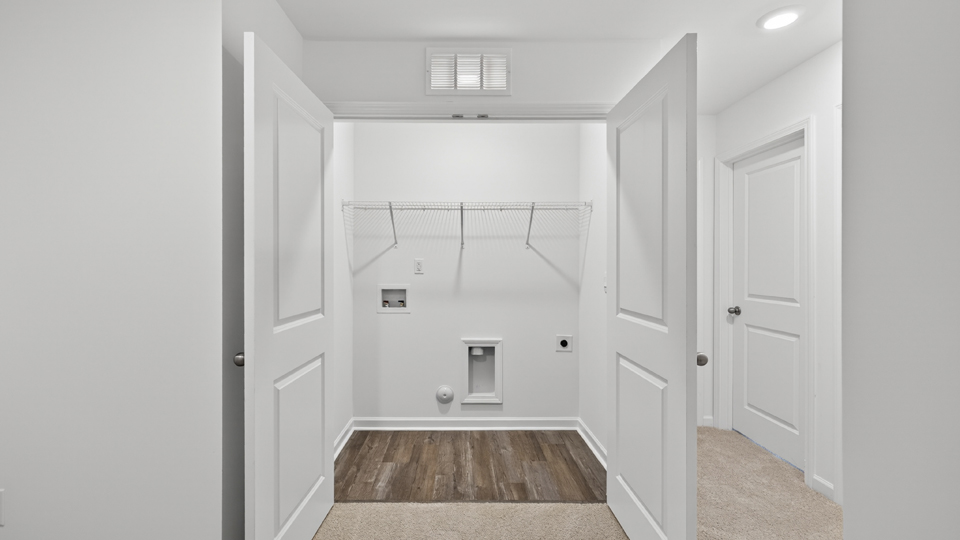 laundry room with wire shelving
