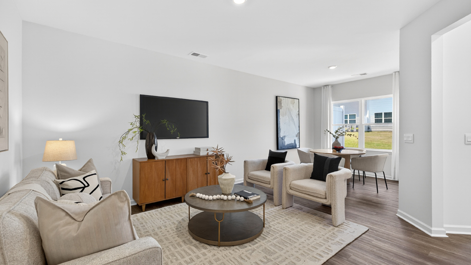 open concept living space with large windows