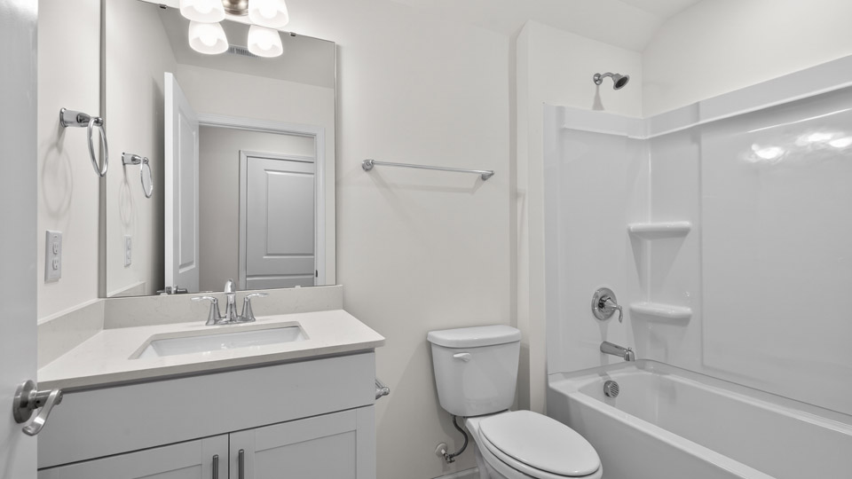Bathroom with sink and tub