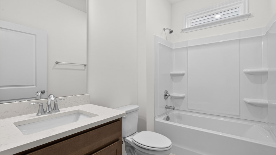 Bathroom with sink and tub