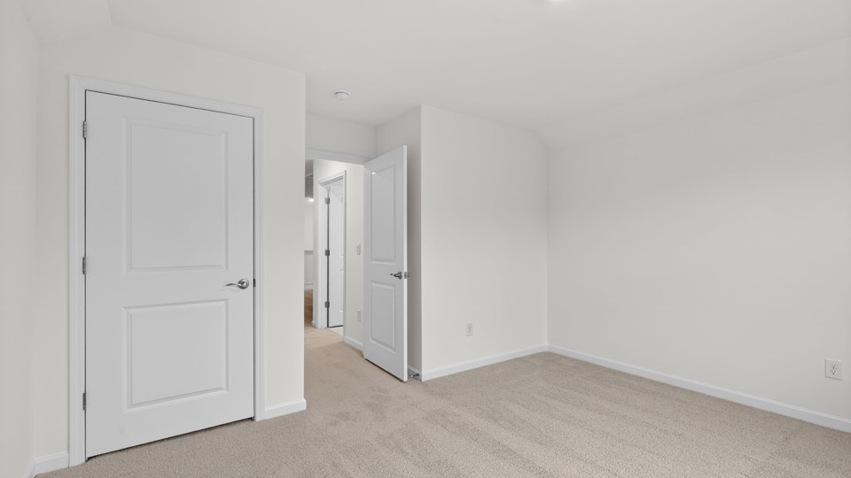 Bedroom with carpet floor and closet
