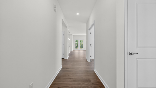 foyer entryway with revwood flooring