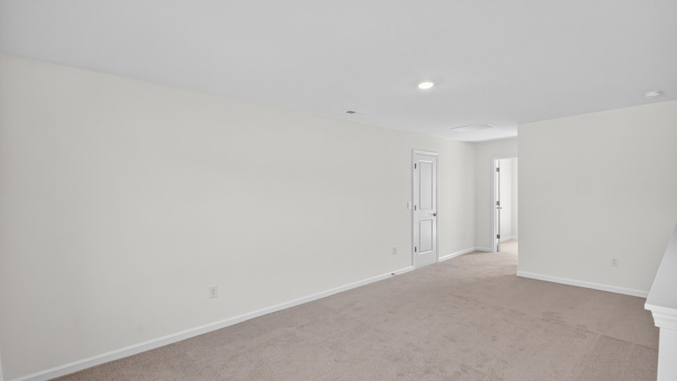 Loft with carpet flooring