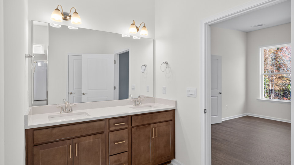 Primary bedroom with quartz counters