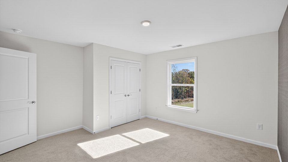 Bedroom with carpet flooring