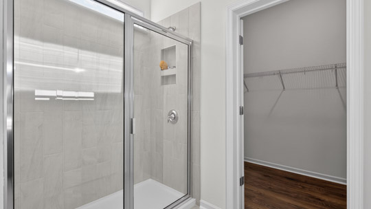 bathroom with glass door walkin shower