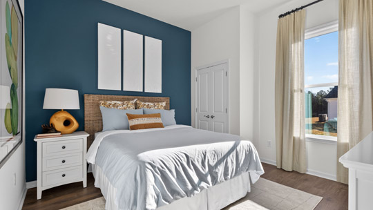 bedroom with revwood flooring