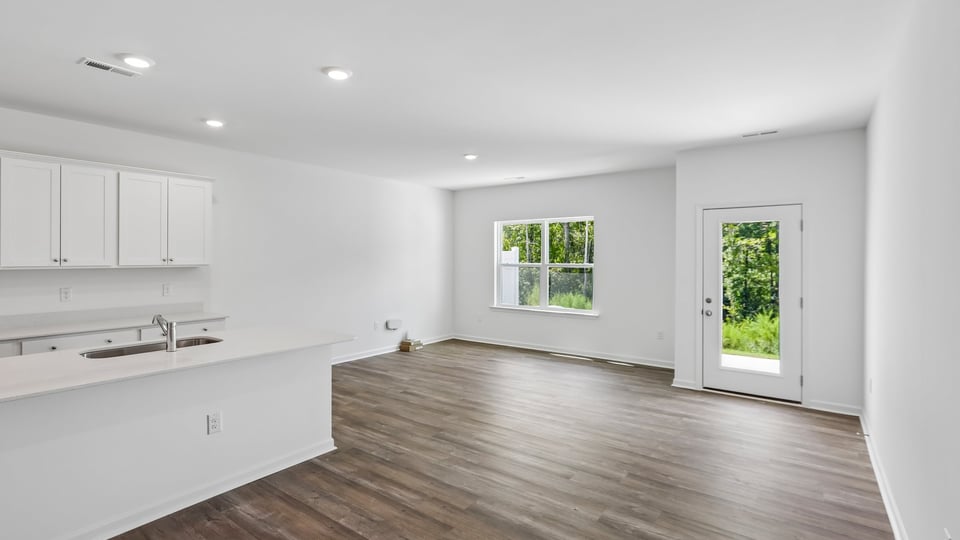 open concept living and dining areas