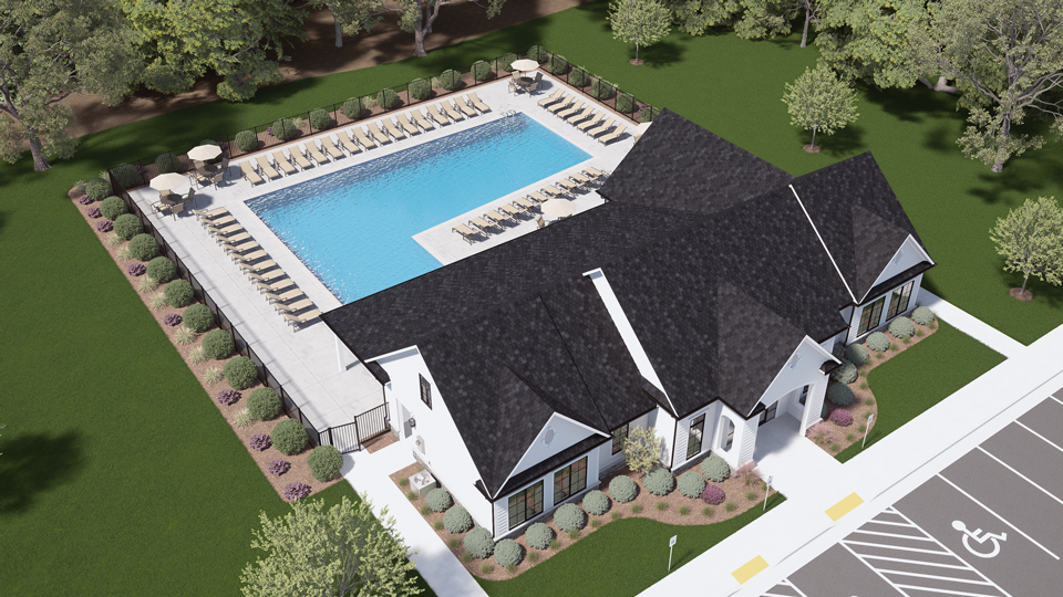 aerial view of community pool and clubhouse