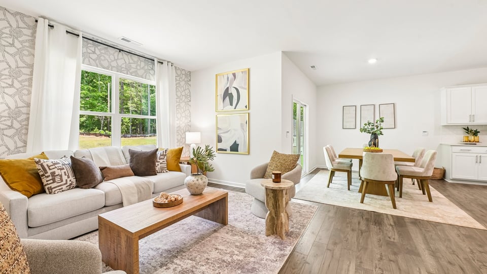 open concept living space with large windows