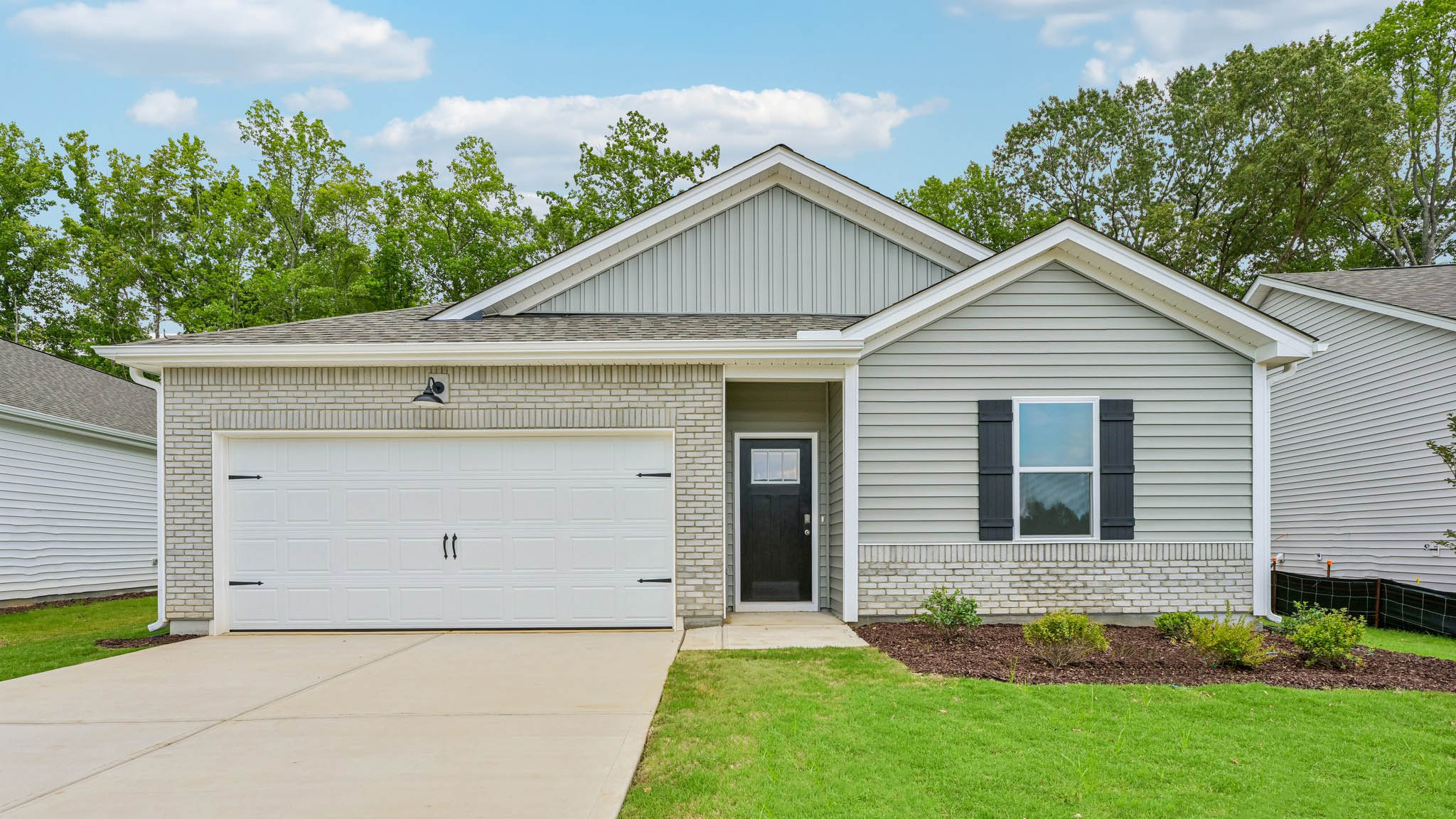 front exterior freeport e with 2 car garage