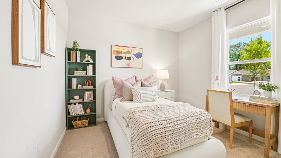 additional bedroom with window, carpeting, closet