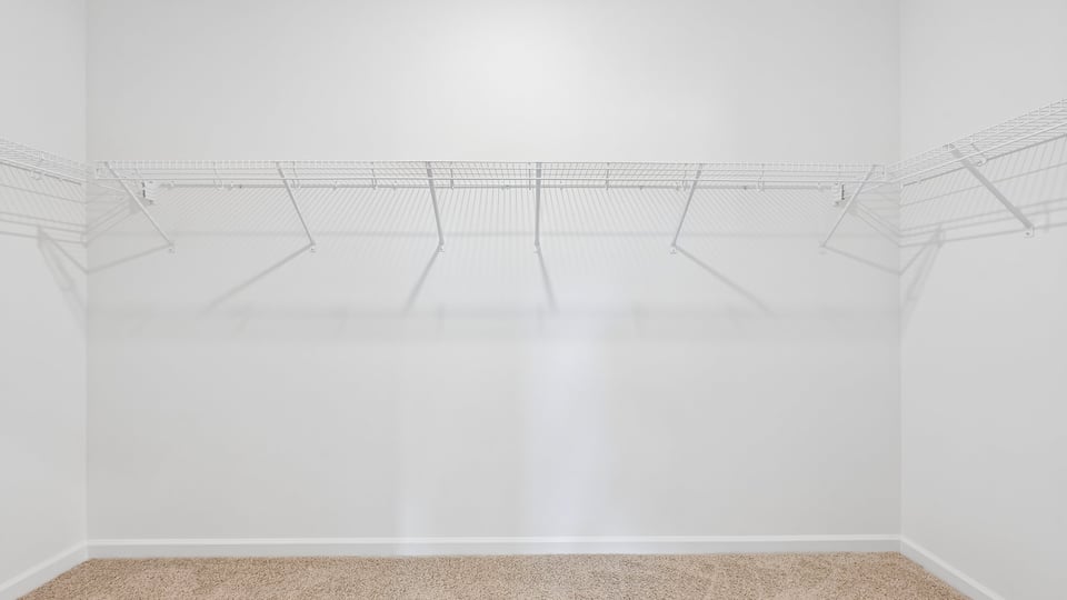 spacious walkin closet with wire shelving