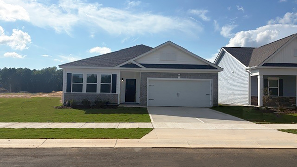 front exterior with 2 car garage