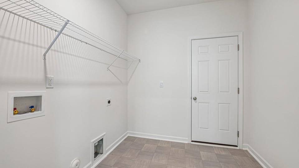 laundry room with wire shelving