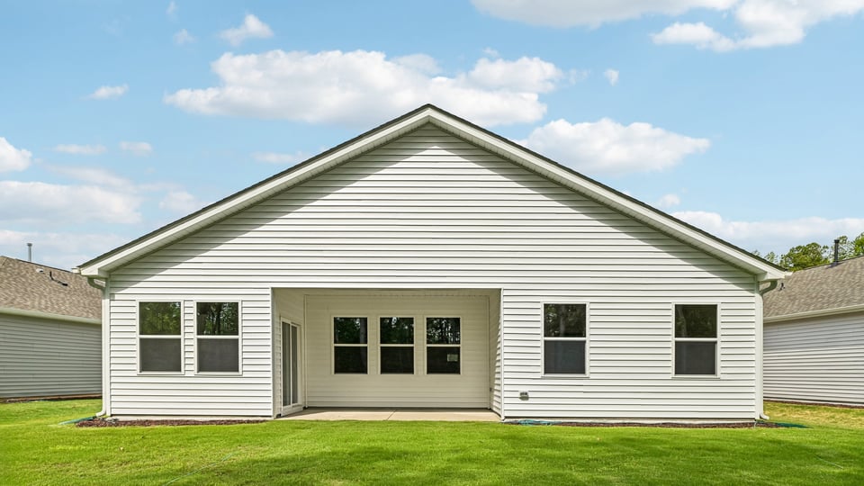back exterior of aberdeen with covered patio and open yard