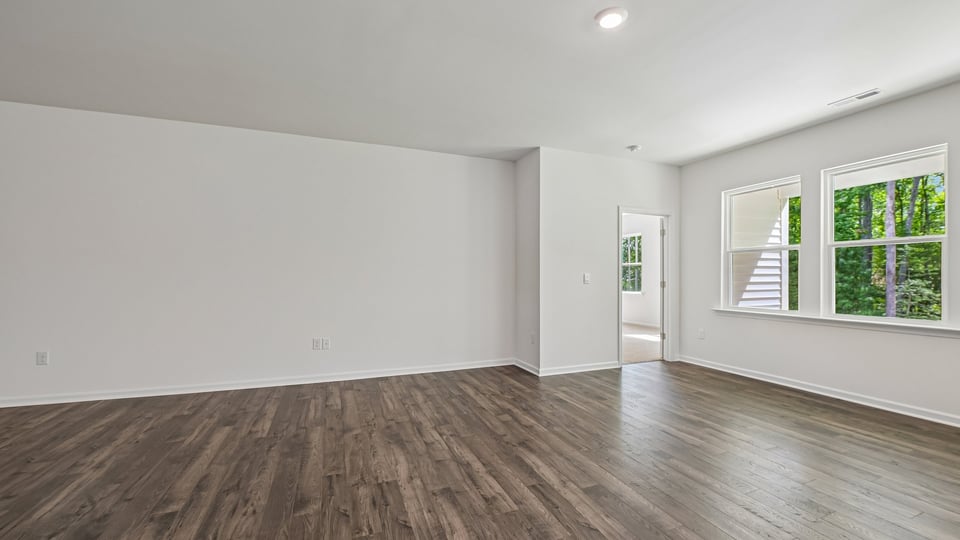 open concept living space with large windows