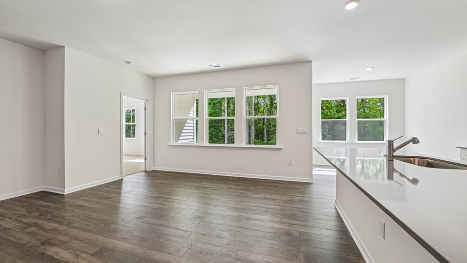 open concept living space with large windows