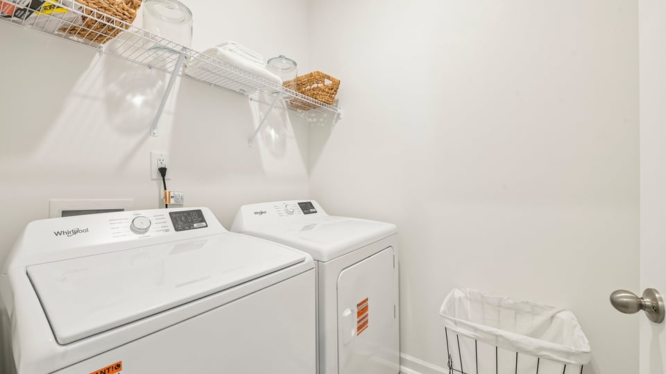 laundry room with wire shelving