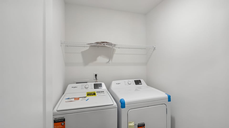 laundry room with wire shelving