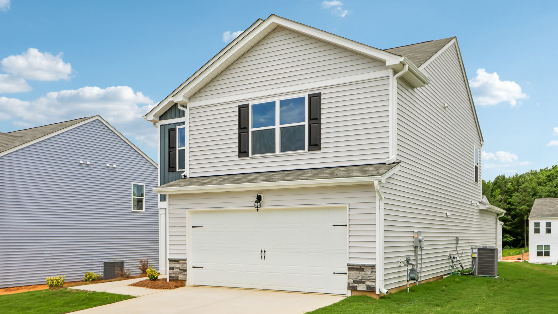 front exterior with 2 car garage