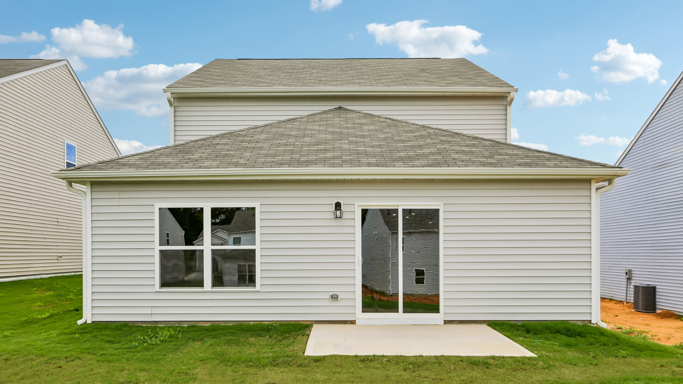 back exterior with patio