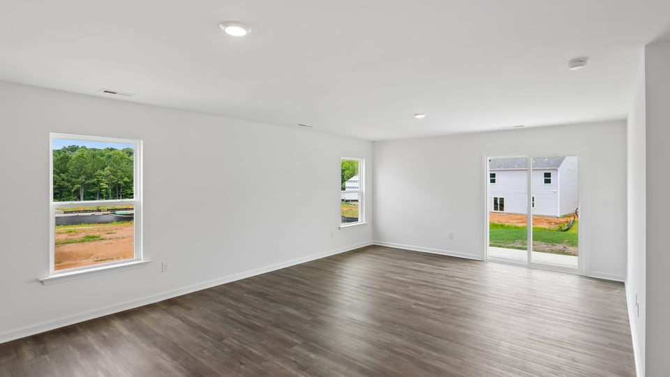 open concept living space with large windows
