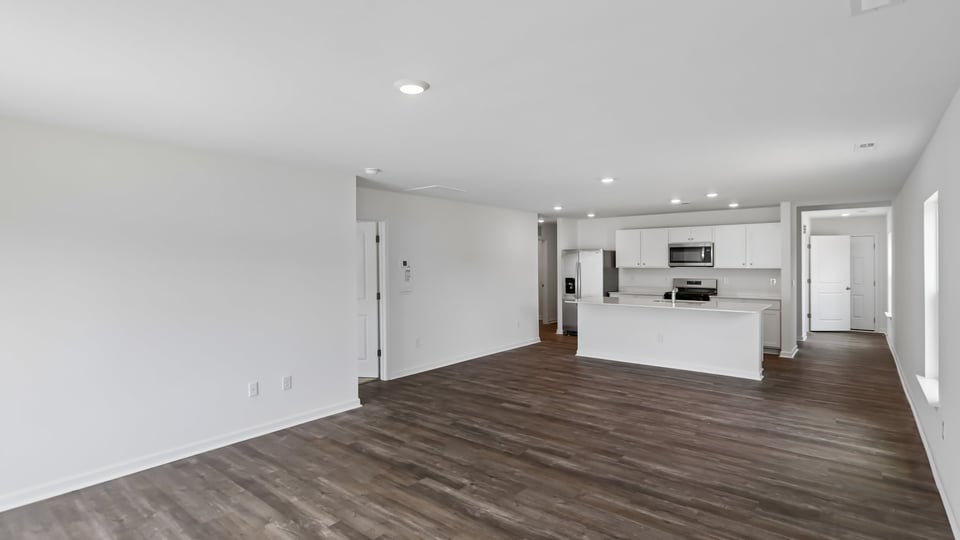 open concept living space with large windows