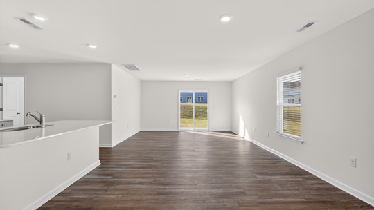 open concept living space with large windows