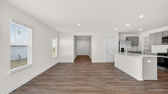 open concept living space with large windows