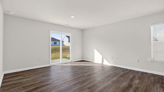 open concept living space with large windows
