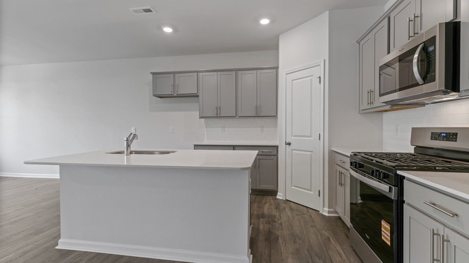 Kitchen with stainless-steel appliances