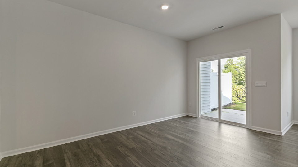 Open-concept dining area with sliding door