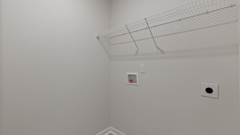 Laundry room with wire shelving