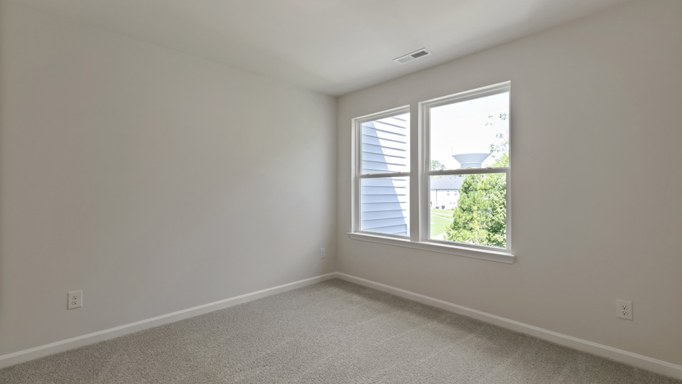 Bedroom with carpet flooring