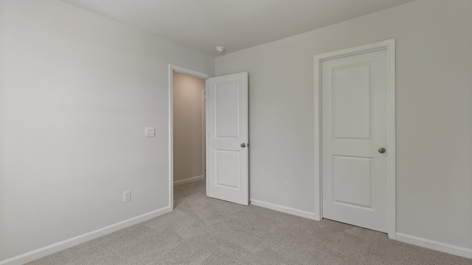Bedroom with carpet flooring