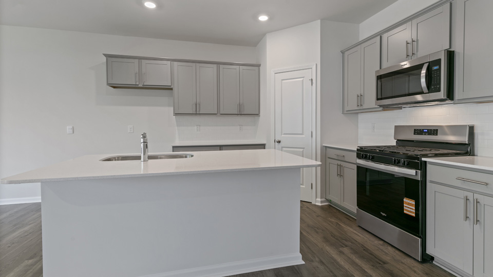 Kitchen with stainless-steel appliances