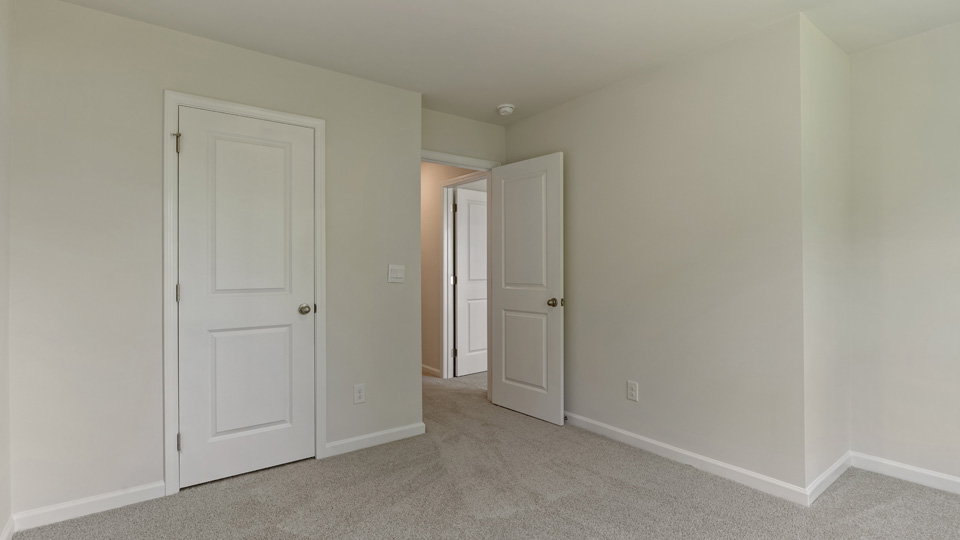 Bedroom with carpet flooring