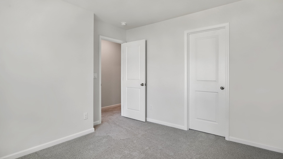 Bedroom with carpet flooring