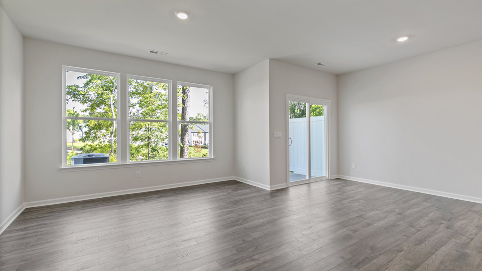 living room with three large windows