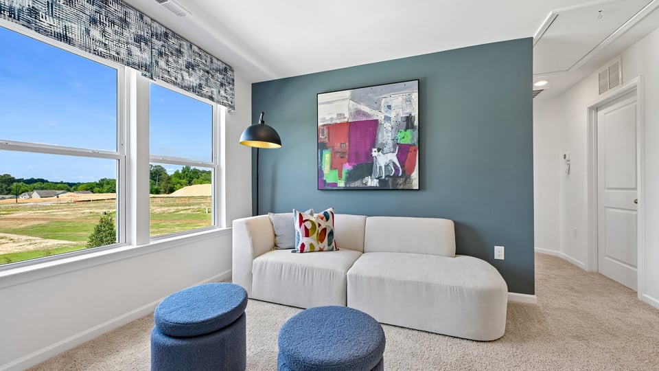 loft with carpet flooring