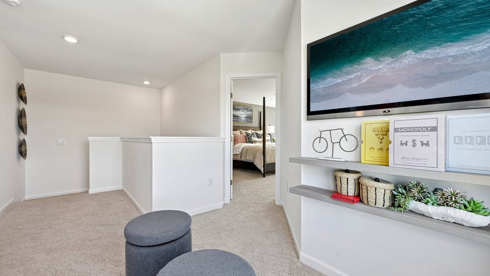 loft with carpet flooring