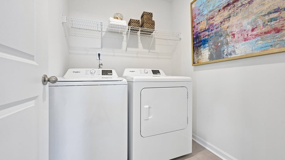 laundry room with washer and dryer